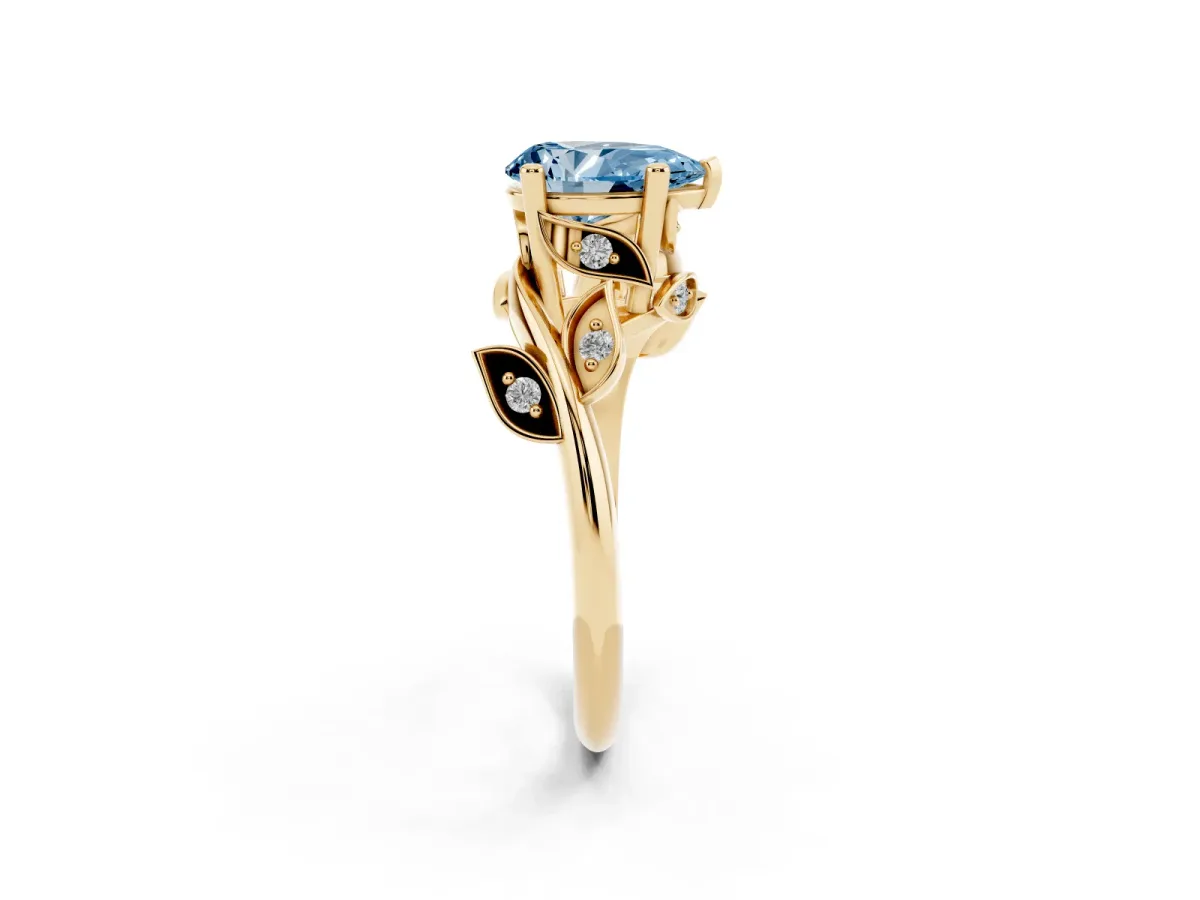 Fancy Blue Pear Cut Solitaire Twist Engagement Ring with Leaf Accents and Prong Setting Yellow gold
