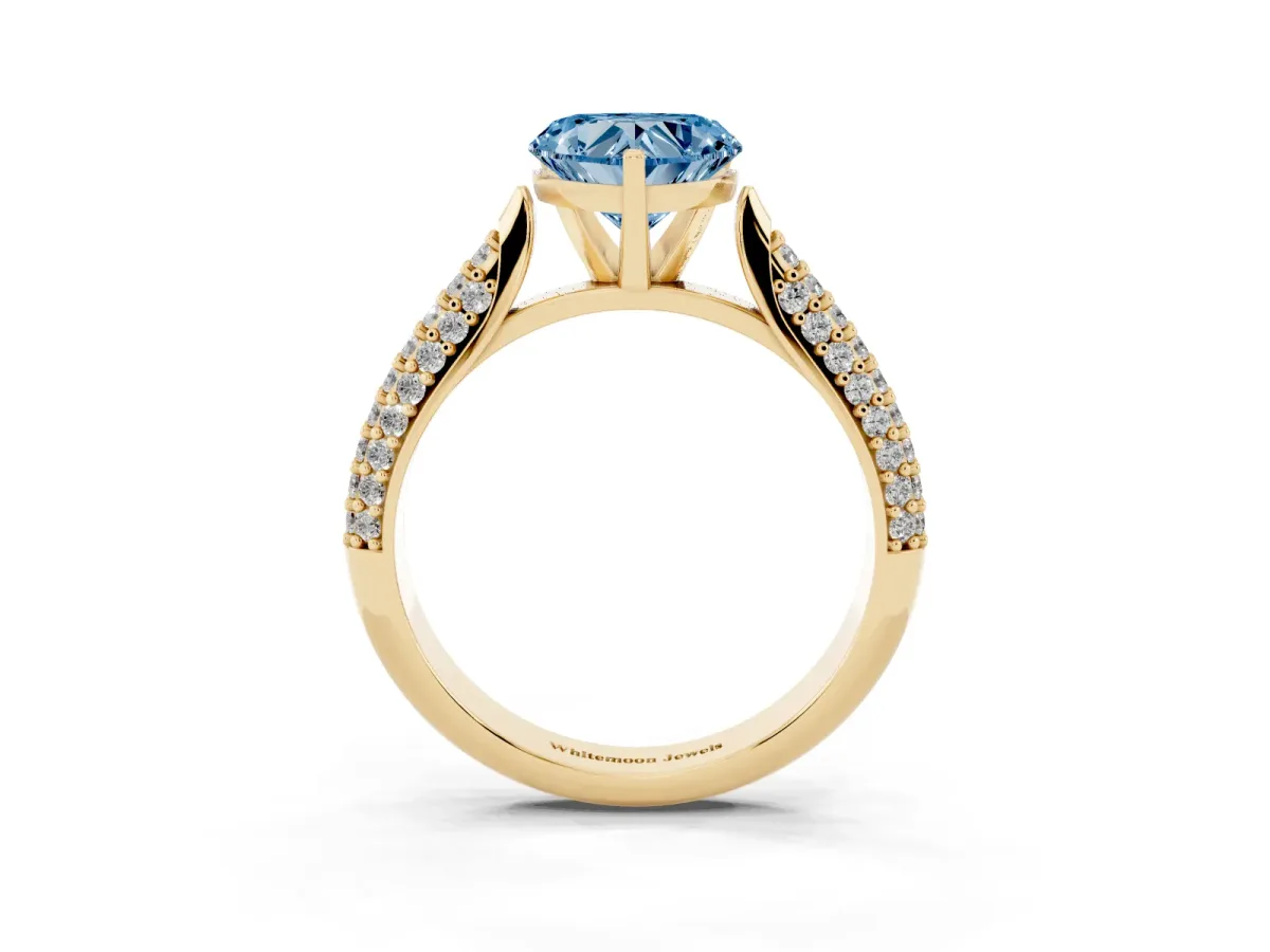 Fancy Blue Heart Cut Diamond Solitaire Engagement Ring with Multi-Row Round Pavé Band and Prong Setting Yellow gold