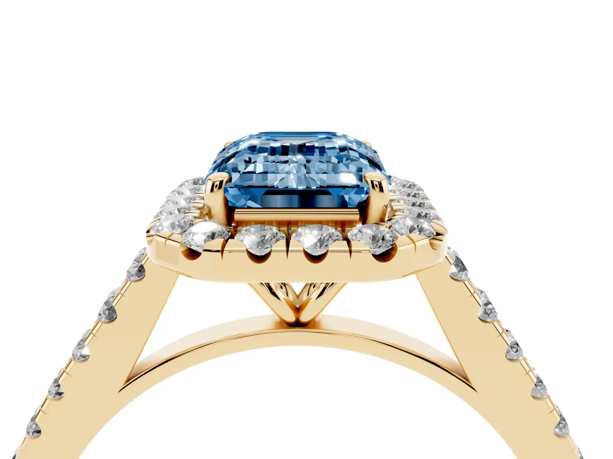 Fancy Blue Emerald Cut Halo Pave Diamond Engagement Ring with Four-Prong Setting Yellow gold