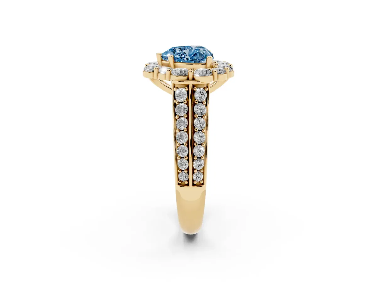Fancy Blue Heart Cut Halo Diamond Engagement Ring with Split Shank and Prong Setting Yellow gold