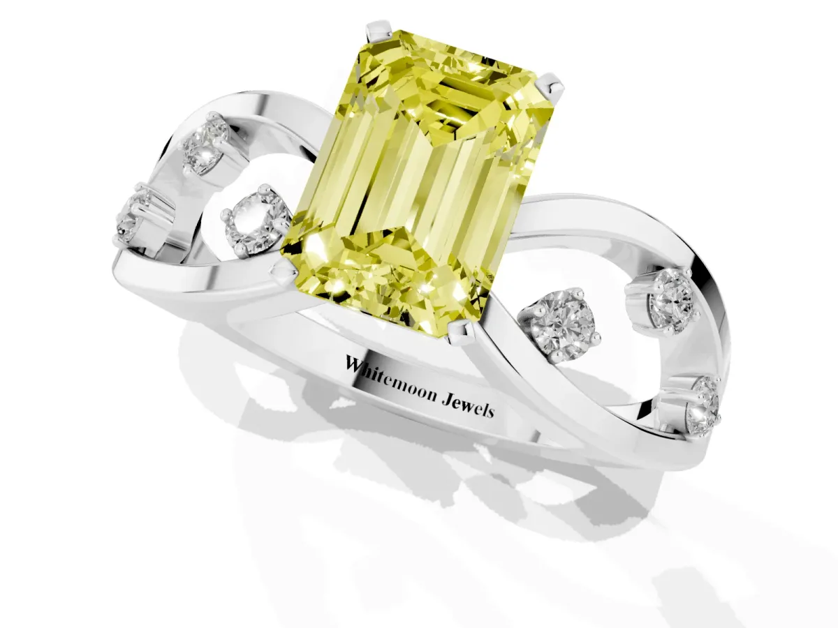 Fancy Yellow Emerald Cut Cut Solitaire Diamond with Side Stones on Criss-Cross Band and Four-Prong Setting Silver