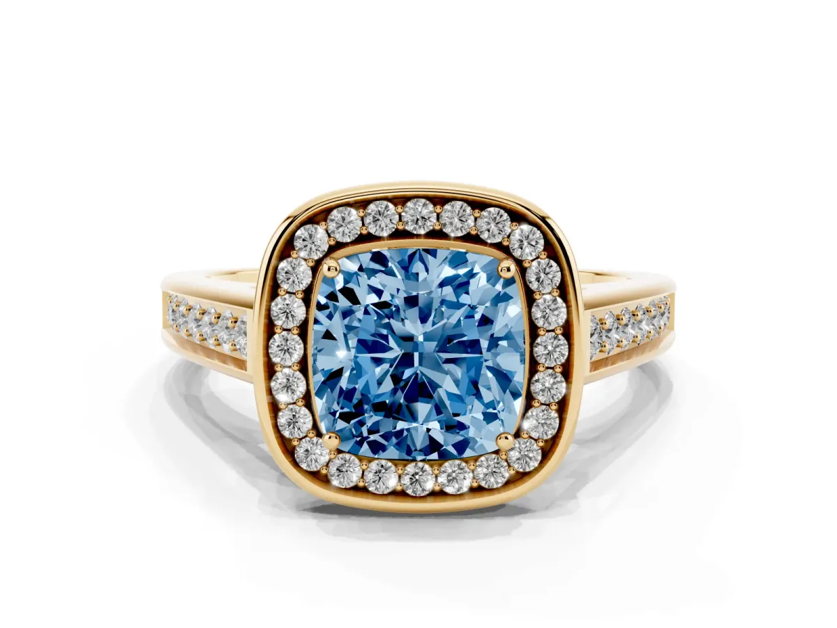Fancy Blue Cushion Cut Halo Solitaire Diamond Ring with Pave Band and Bezel Setting Yellow gold