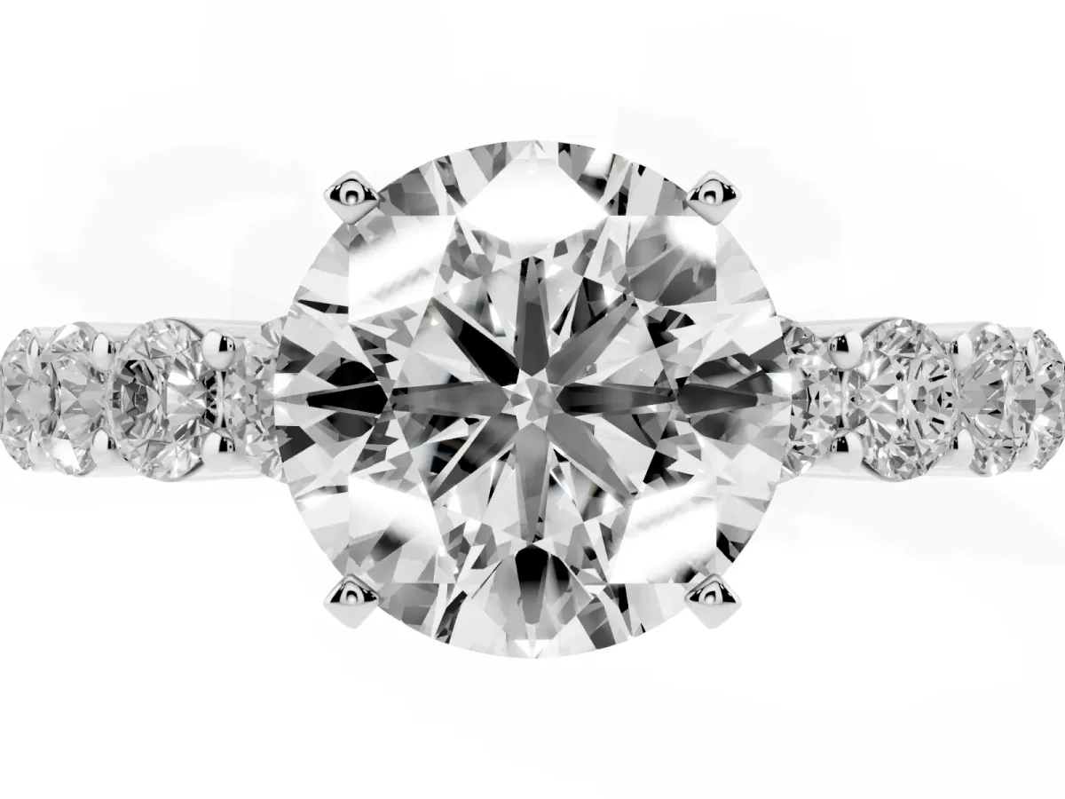 Round Cut Diamond Solitaire Ring with Shared Prong Round Side Stones Silver
