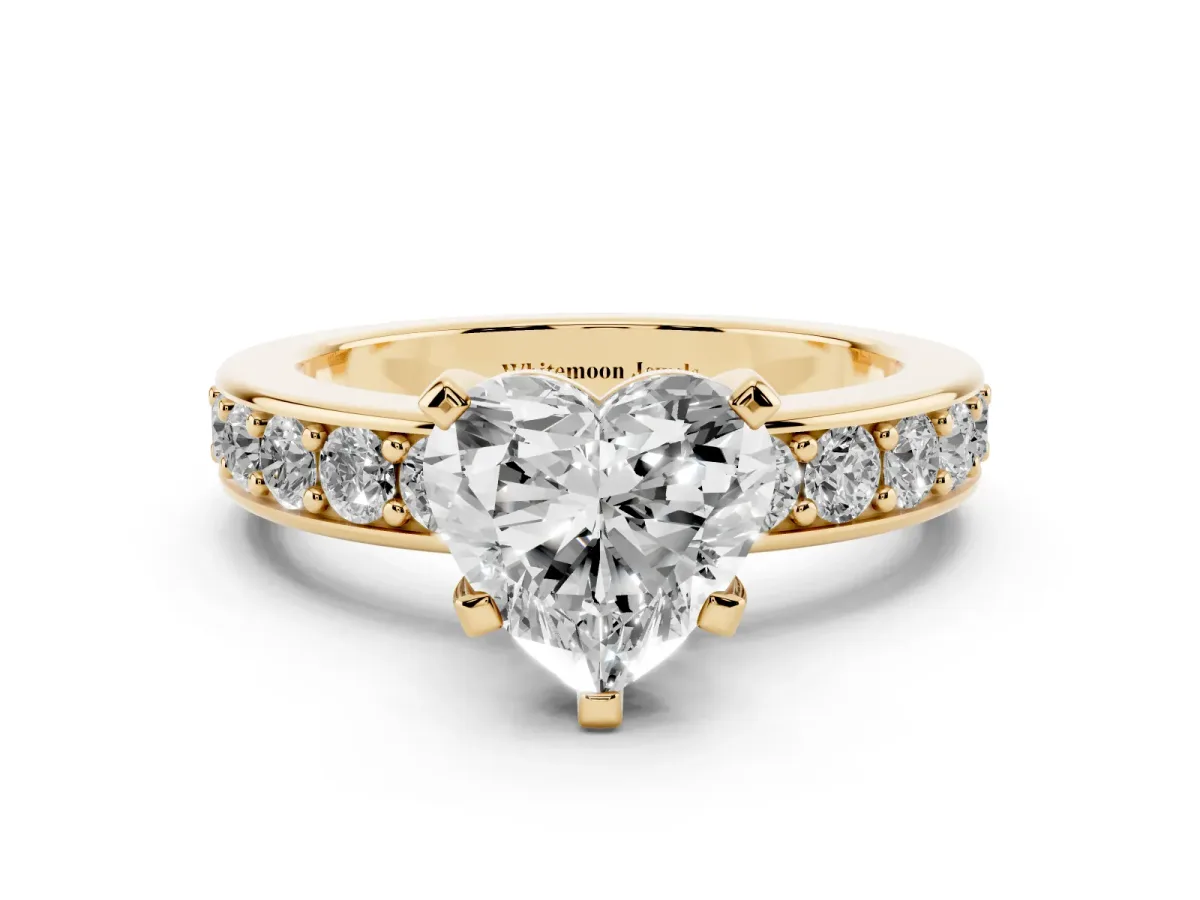 Heart Cut Diamond Engagement Ring with Channel Set Round Band and Prong Setting Yellow gold