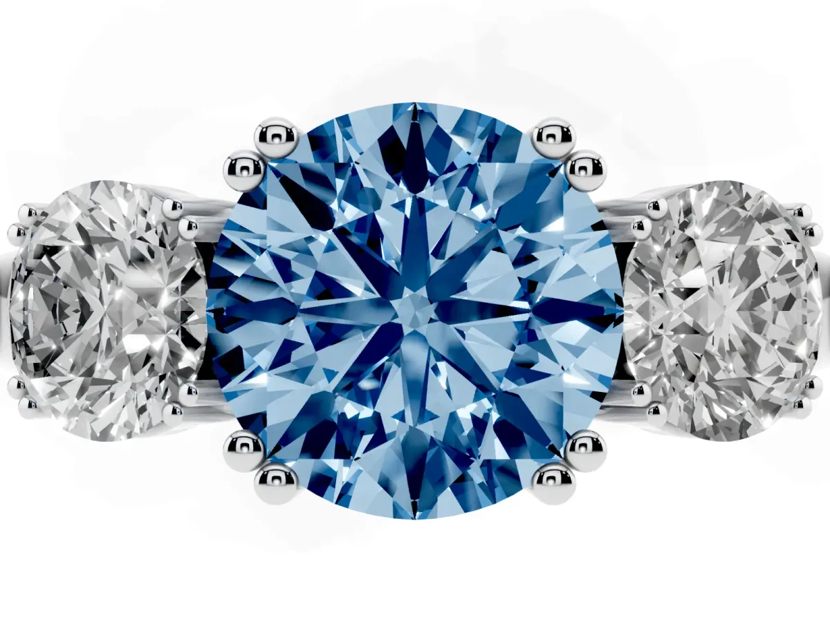 Fancy Blue Three-Stone Round Cut Cut Diamond Ring with Channel Set Band and Four-Prong Setting Silver