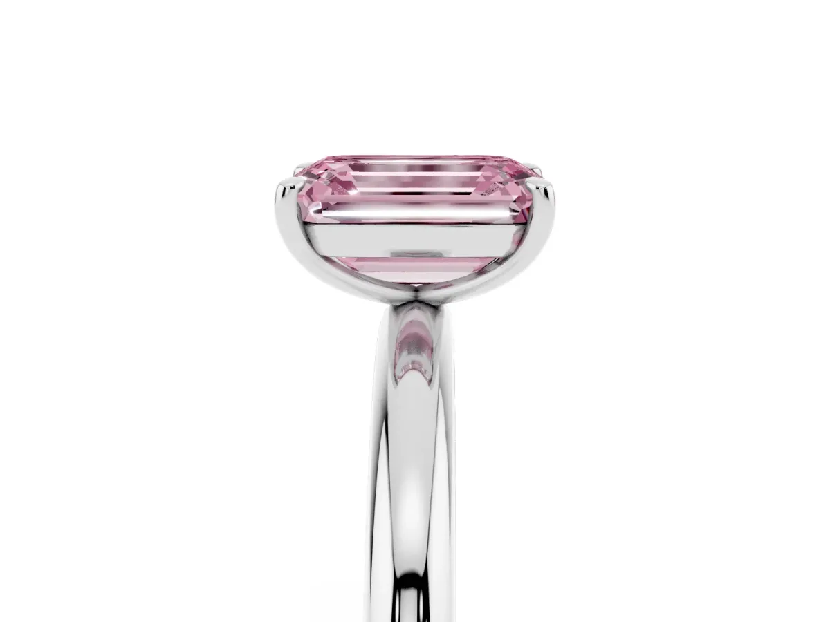 Fancy Pink Emerald Cut Solitaire Diamond Ring with Four-Prong Setting on a Plain Band Silver
