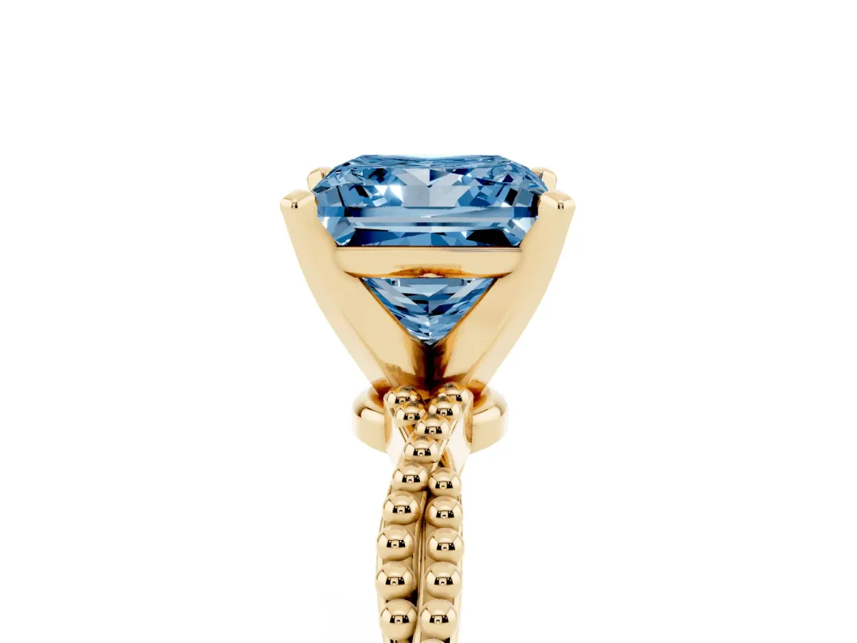 Fancy Blue Princess Cut Solitaire Twisted Band with Bead Prong Setting Yellow gold