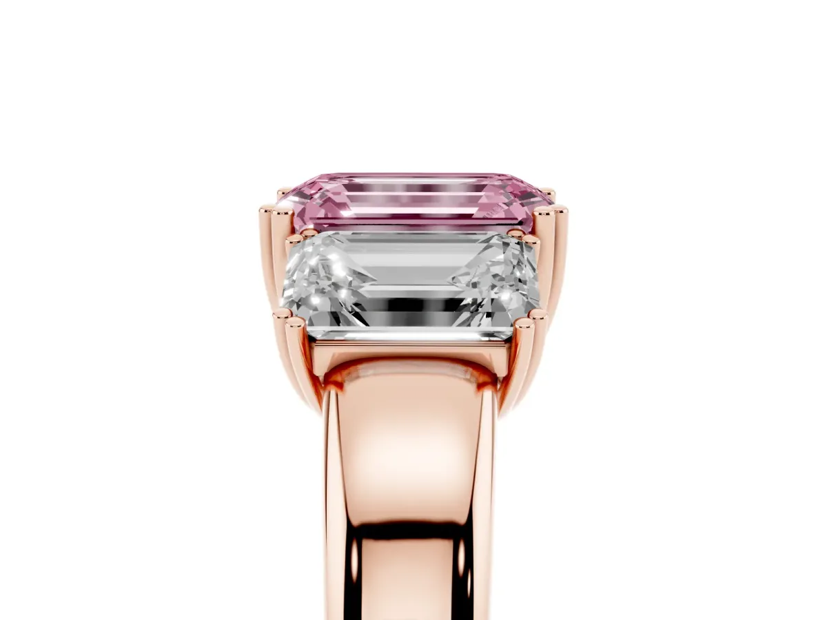 Fancy Pink Three-Stone Emerald Cut Cut Diamond Ring with Channel Set Band and Four-Prong Setting Rose gold