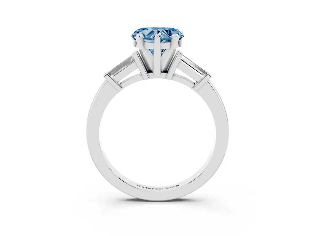Fancy Blue Heart Cut Cut Diamond Solitaire Ring with Tapered Baguette Accents and Four-Prong Setting Silver