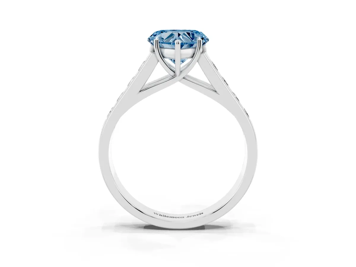 Fancy Blue Heart Cut Brilliant Channel-Set Solitaire Ring with Four-Prong Setting Silver