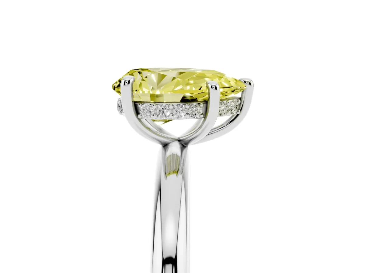 Fancy Yellow Pear Cut Diamond Solitaire Ring with Thin Band and Four-Prong Setting Silver