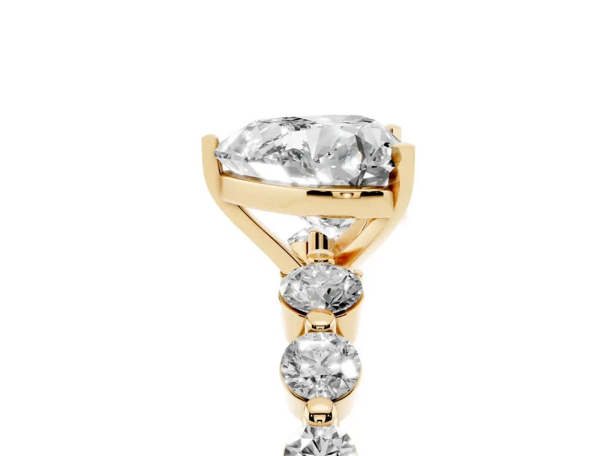 Heart Cut Solitaire Diamond Ring with Pave Band and Four-Prong Setting Yellow gold