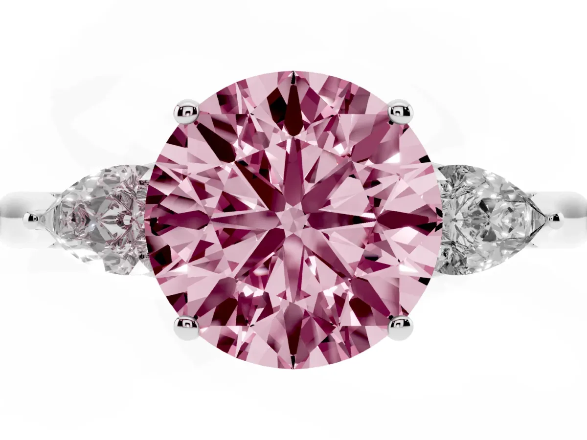 Fancy Pink Three-Stone Round Cut Diamond Ring with Pear Side Stones in Four-Prong Setting Platinum