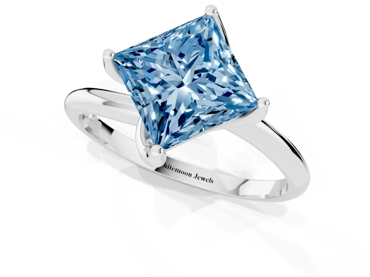 Fancy Blue Princess Cut Diamond Solitaire Engagement Ring with Four-Prong Setting and Classic Band Silver