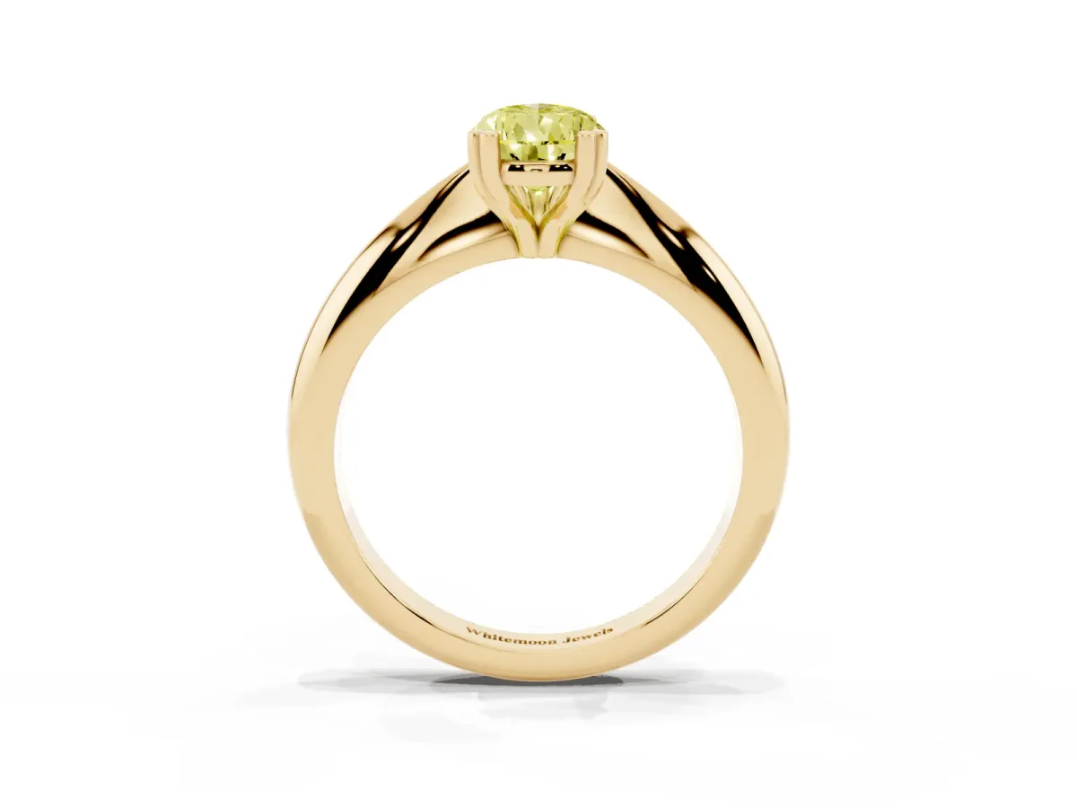Fancy Yellow Pear Cut Cut Solitaire Engagement Ring with Tapered Band and Four-Prong Setting Yellow gold