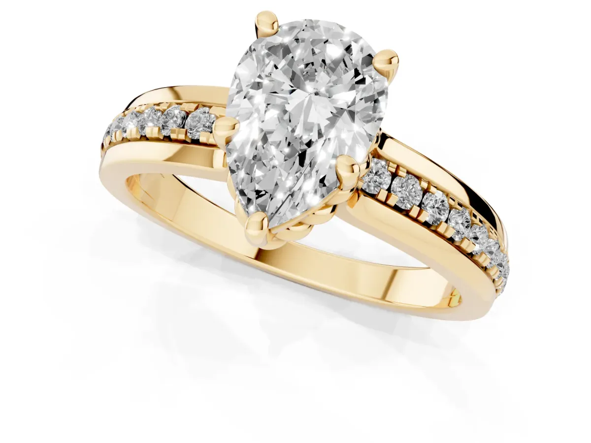 Pear Cut Solitaire Diamond Ring with Channel Set Band and Six-Prong Setting Yellow gold
