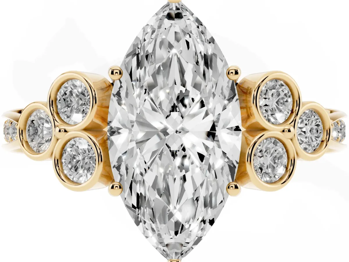 Marquise Cut Cut Diamond Engagement Ring with Bezel Set Round Side Stones and Prong Setting Yellow gold
