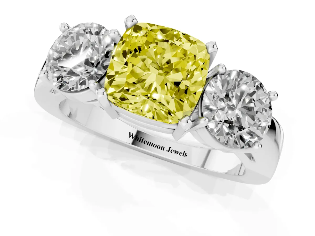 Fancy Yellow Three-Stone Cushion Cut Diamond Ring with Round Side Stones, Classic Band, and Four-Prong Setting Silver