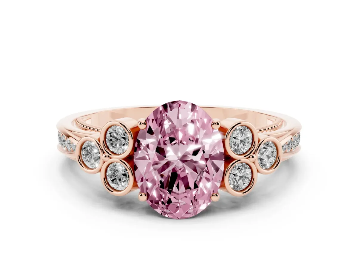 Fancy Pink Oval Cut Cut Diamond Engagement Ring with Bezel Set Round Side Stones and Prong Setting Rose gold