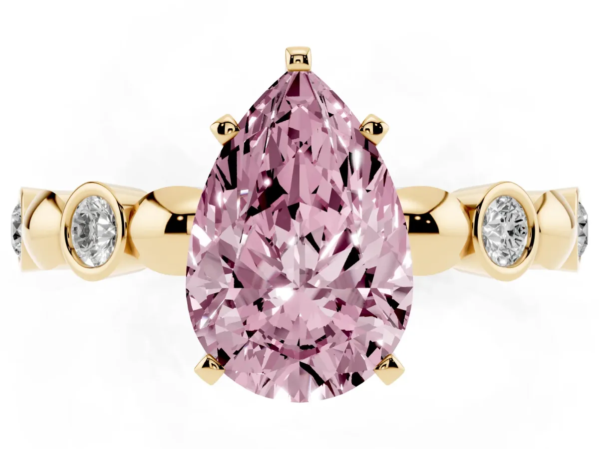 Fancy Pink Pear Cut Solitaire Bezel-Set Diamond Ring with Beaded Band and Four-Prong Setting Yellow gold
