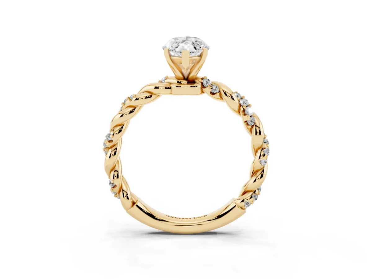 Marquise Cut Diamond Solitaire Ring with Twisted Band and Pavé Accents Yellow gold
