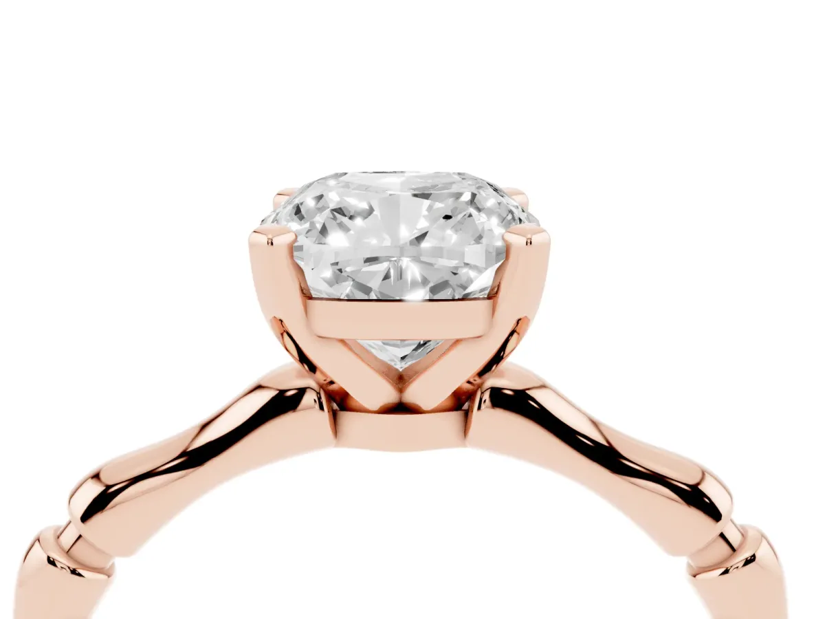 Cushion Cut Solitaire Diamond Ring with Bamboo Band and Four-Prong Setting Rose gold