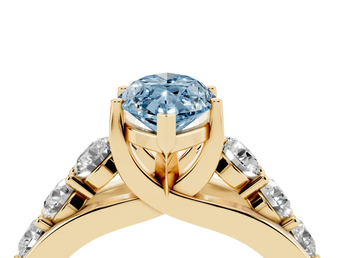 Fancy Blue Marquise Cut Diamond Engagement Ring with Pavé Band and Four-Prong Setting Yellow gold