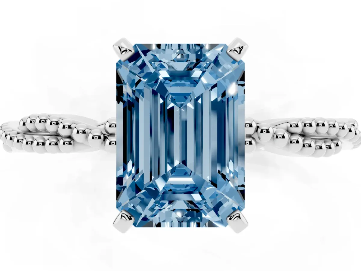 Fancy Blue Emerald Cut Solitaire Twisted Band with Bead Prong Setting Silver