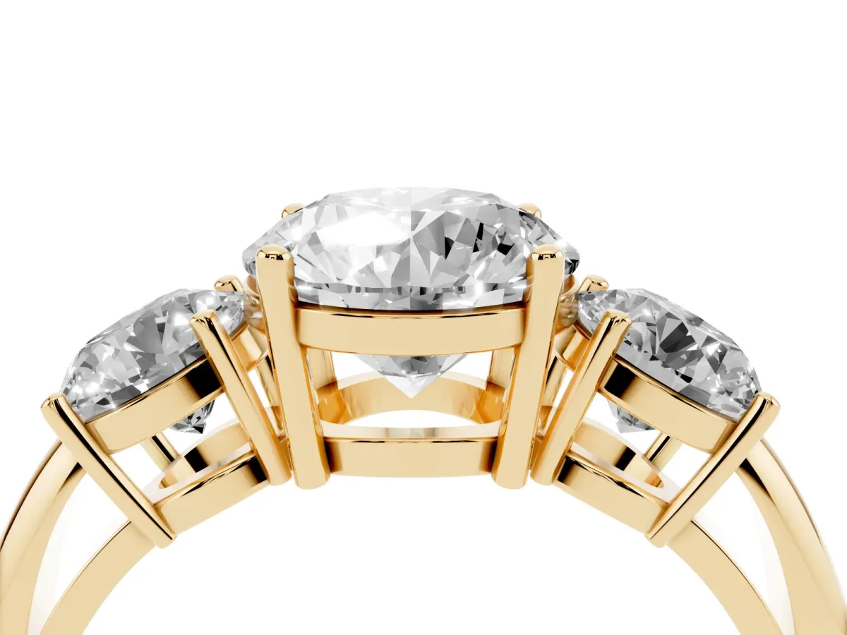 Three-Stone Round Cut Cut Diamond Engagement Ring with Prong Setting on a White Gold Band Yellow gold
