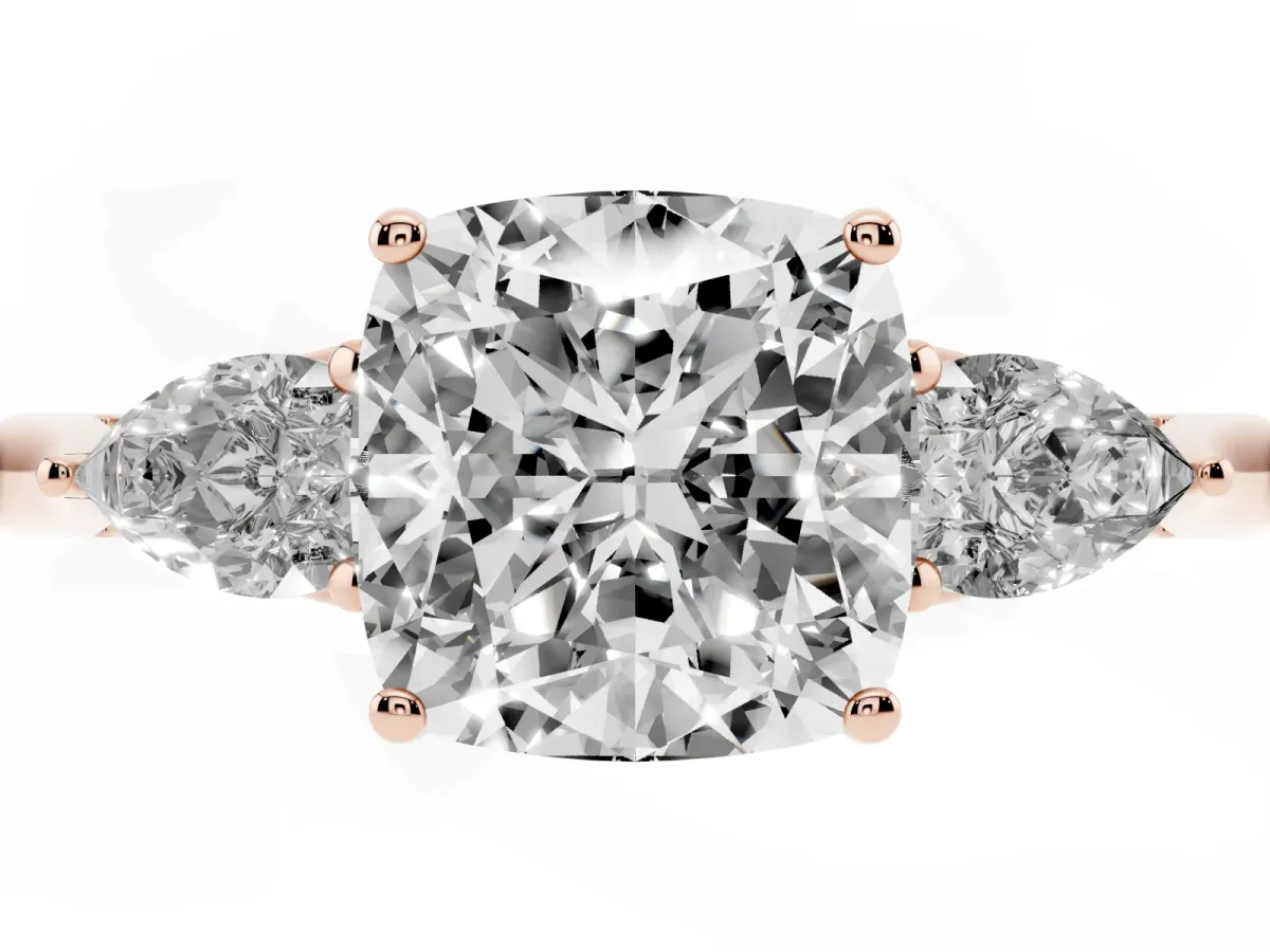 Cushion Cut Diamond Three-Stone Ring with Pear Side Stones and Prong Setting Rose gold