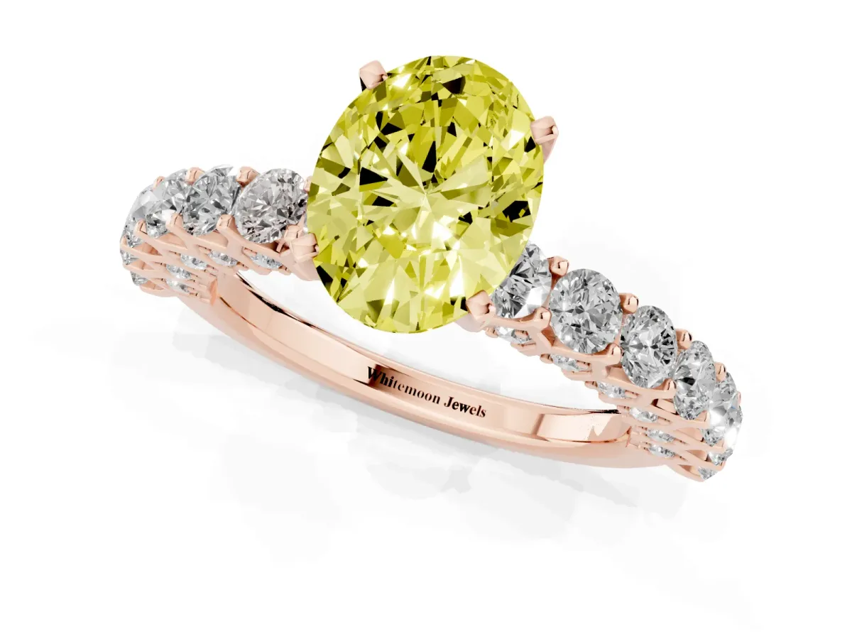 Fancy Yellow Oval Cut Diamond Solitaire Ring with Shared Prong Pavé Band and Four-Prong Setting Rose gold
