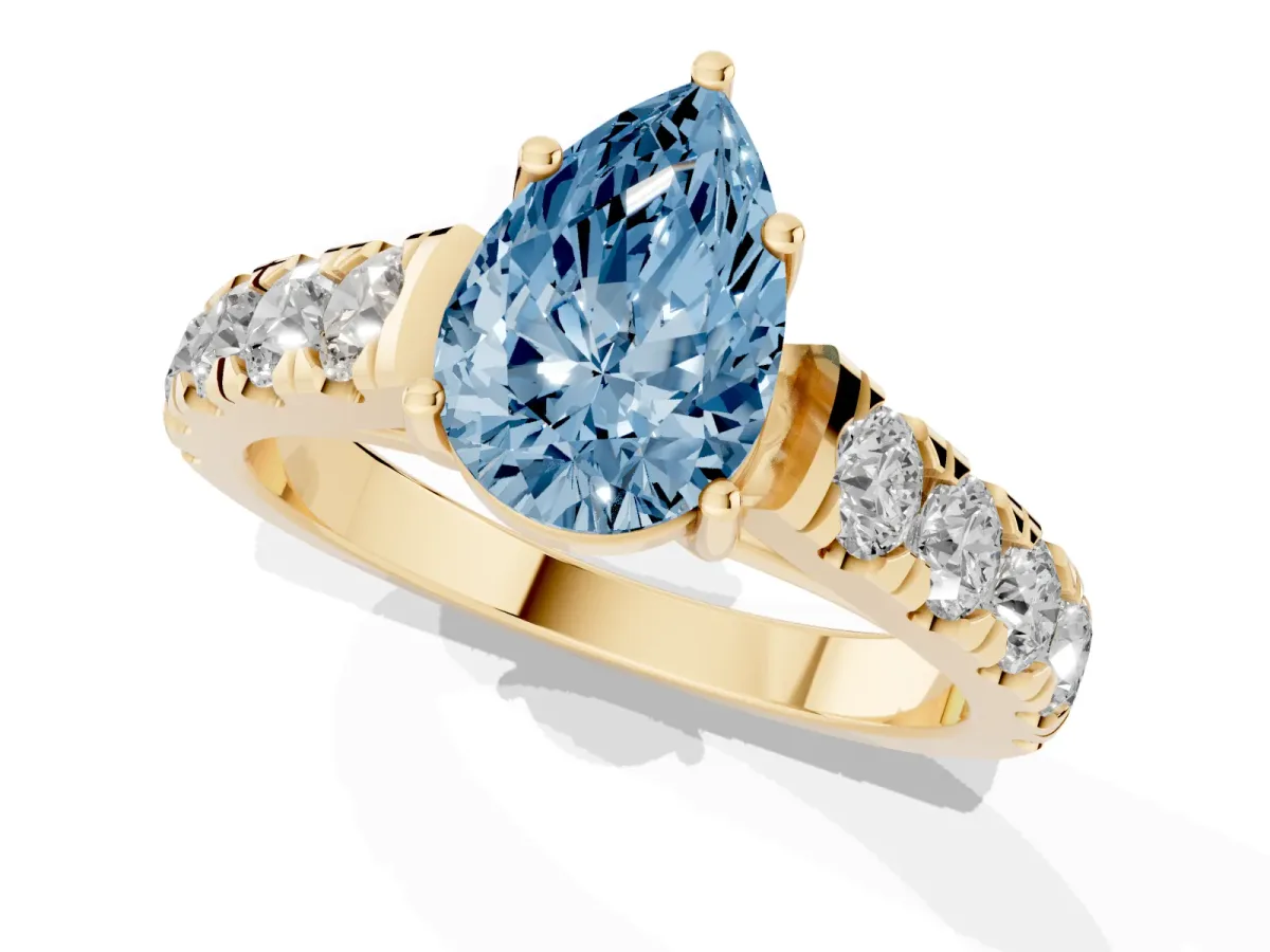 Fancy Blue Pear Cut Cut Diamond Solitaire Ring with Micro Pave Band and Prong Setting Yellow gold