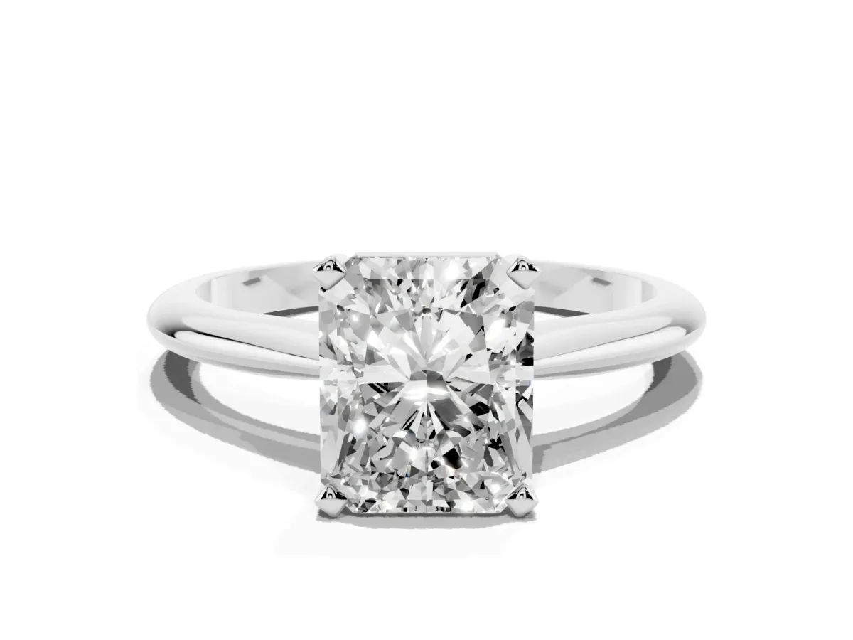 Radiant Cut Cut Solitaire Ring with Four-Prong Setting on a Classic Band Platinum