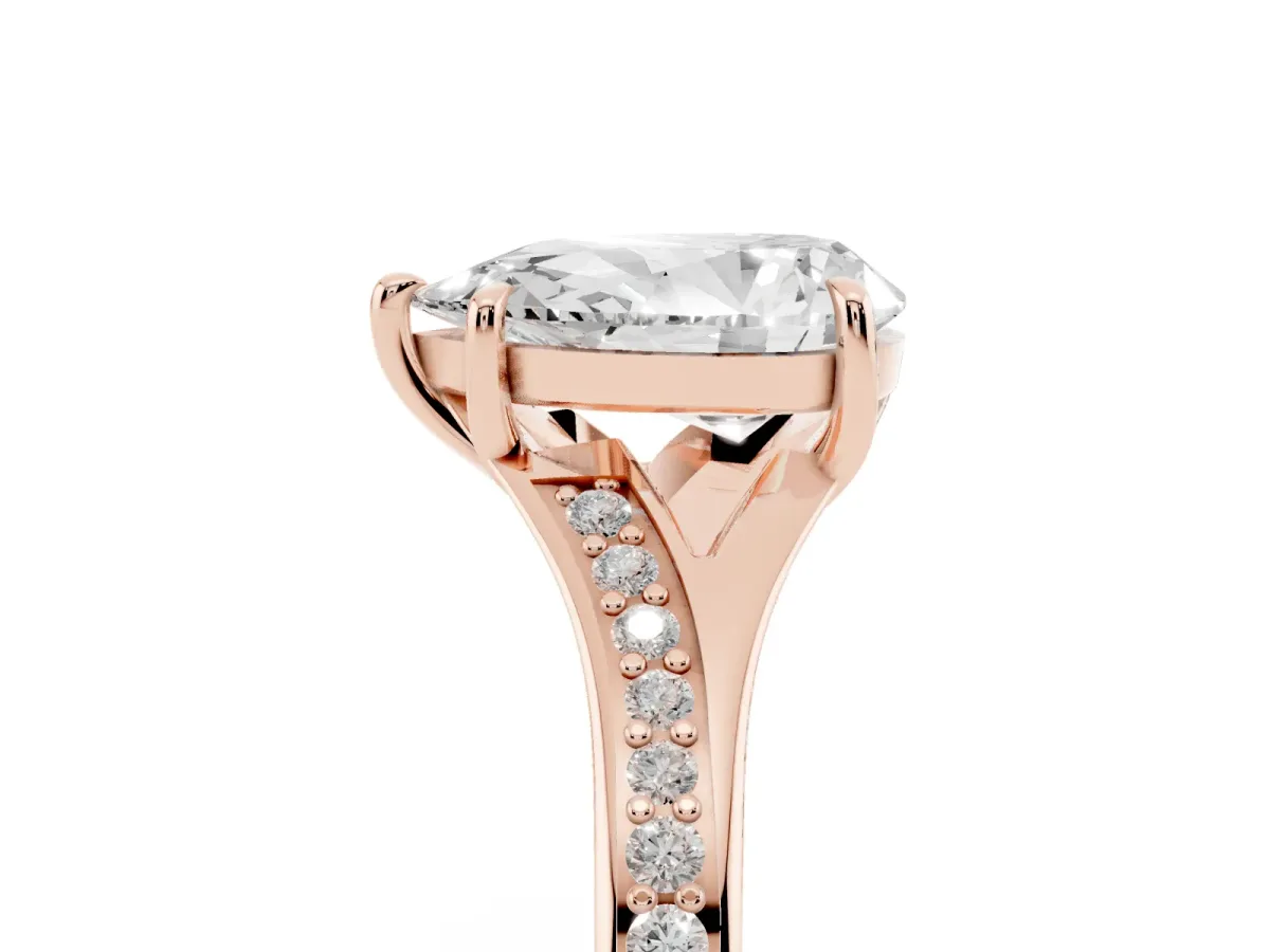 Pear Cut Diamond Solitaire Ring with Pavé Band and Prong Setting Rose gold