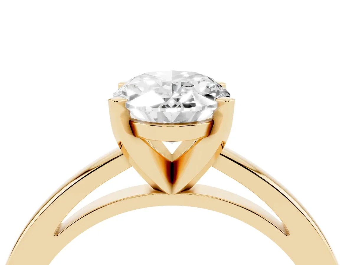 Oval Cut Solitaire Diamond Engagement Ring with Four-Prong Setting on a Classic Band Yellow gold