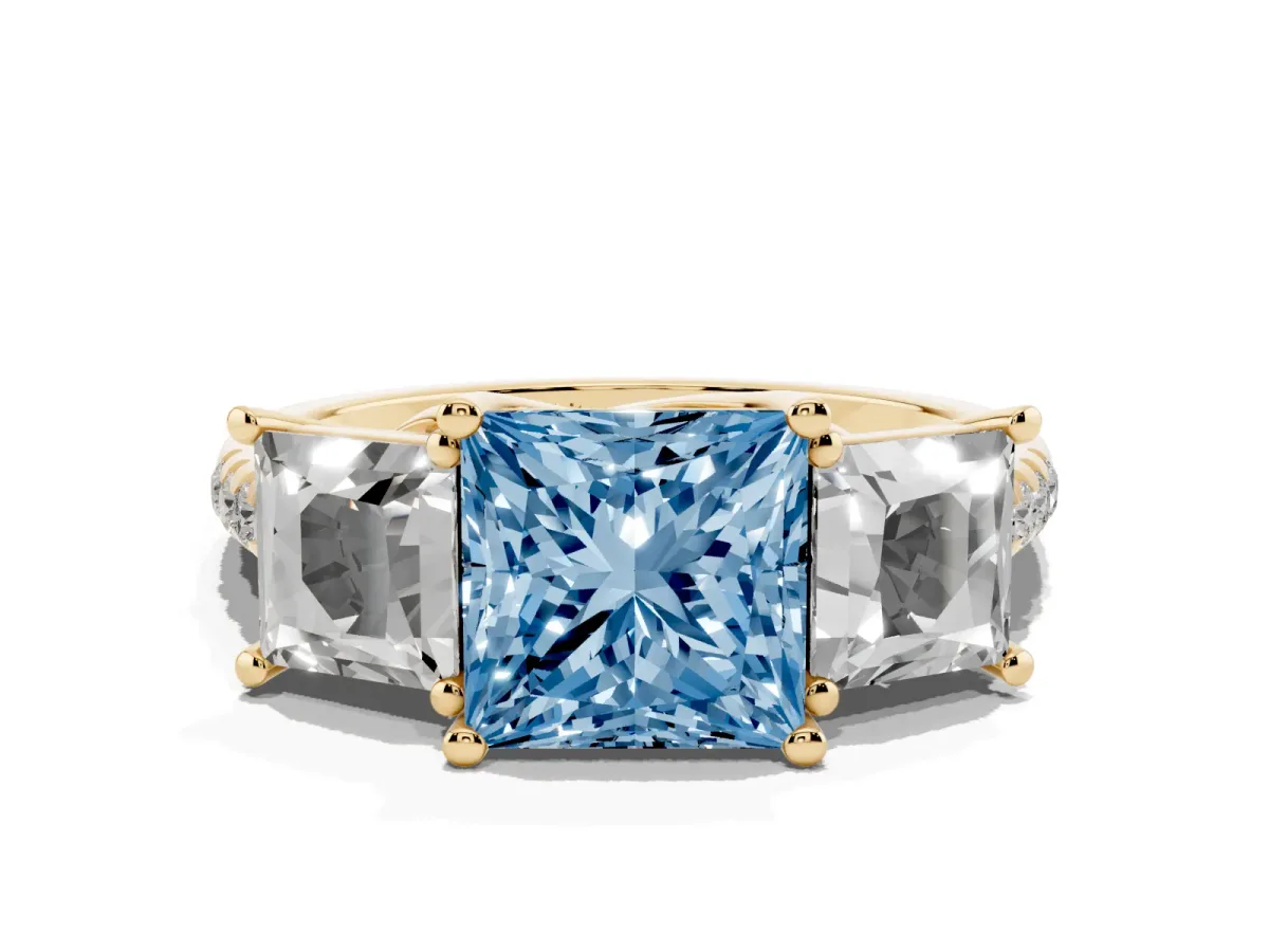 Fancy Blue Three-Stone Princess Cut Diamond Ring with Round Pavé Band and Prong Setting Yellow gold