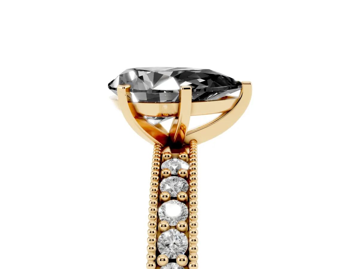 Fancy Black Pear Cut Diamond Milgrain Pavé Engagement Ring with Four-Prong Setting Yellow gold