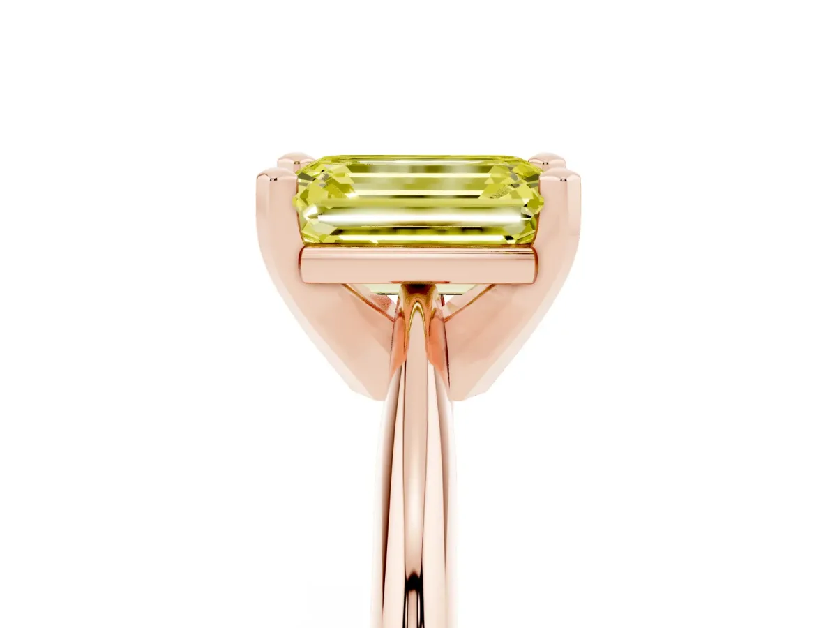 Fancy Yellow Emerald Cut Cut Solitaire Ring with Four-Prong Setting on a Classic Band Rose gold