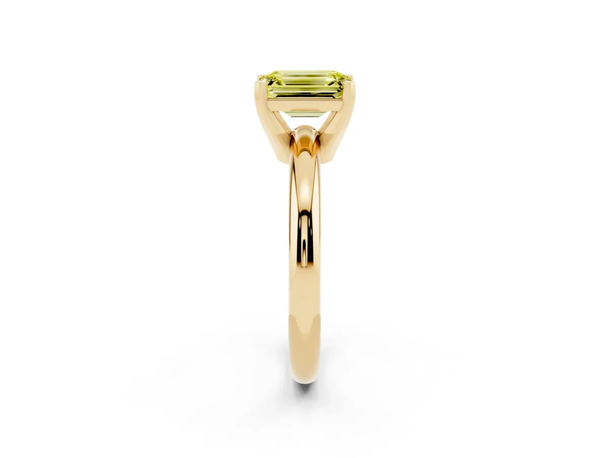 Fancy Yellow Emerald Cut Diamond Solitaire Engagement Ring with Round Band and Four-Prong Setting Yellow gold