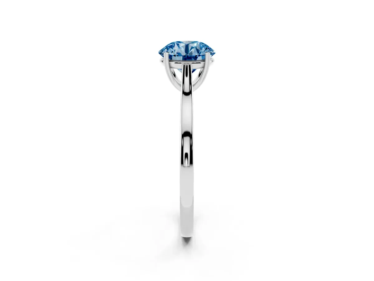 Fancy Blue Round Cut Solitaire Heart Prong Engagement Ring with Tapered Band Silver