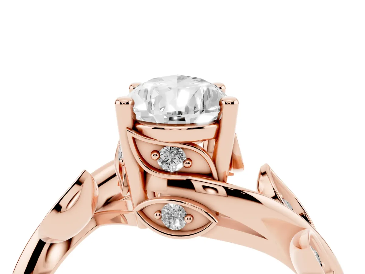 Pear Cut Solitaire Twist Engagement Ring with Leaf Accents and Prong Setting Rose gold
