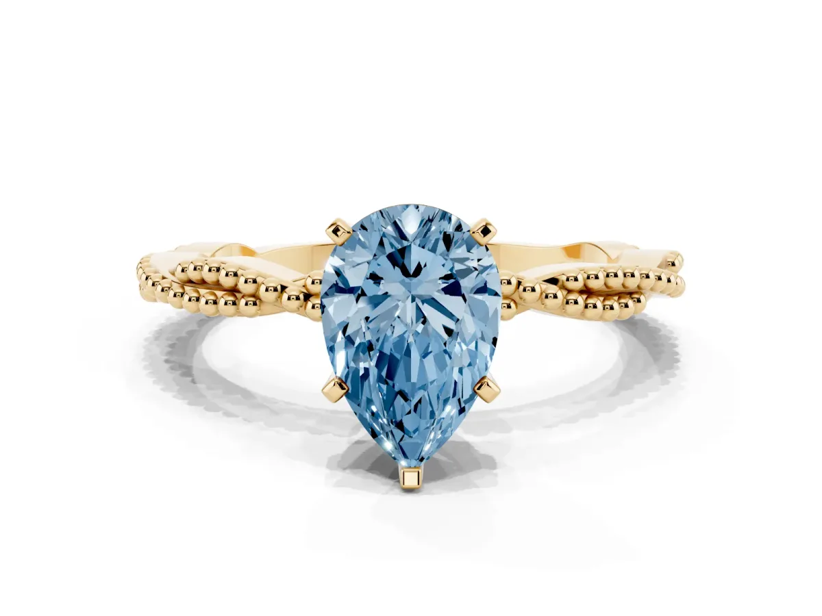 Fancy Blue Pear Cut Solitaire Twisted Band with Bead Prong Setting Yellow gold
