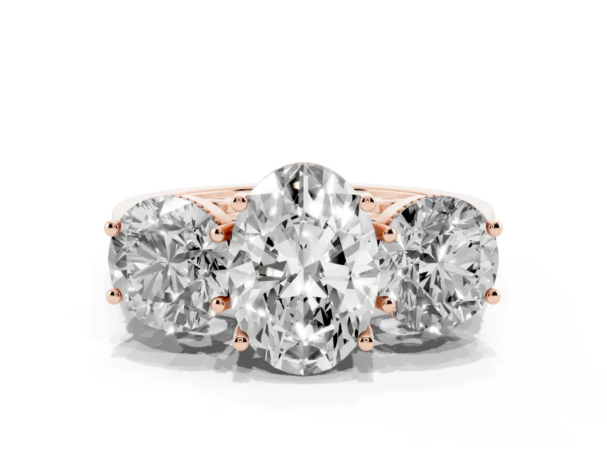 Three-Stone Oval Cut Diamond Engagement Ring with Prong Setting on a Classic Band Rose gold