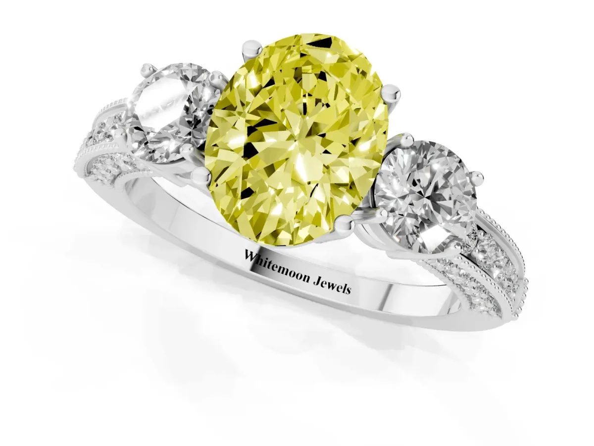 Fancy Yellow Oval Cut Three-Stone Diamond Ring with Pavé Band and Four-Prong Setting Silver