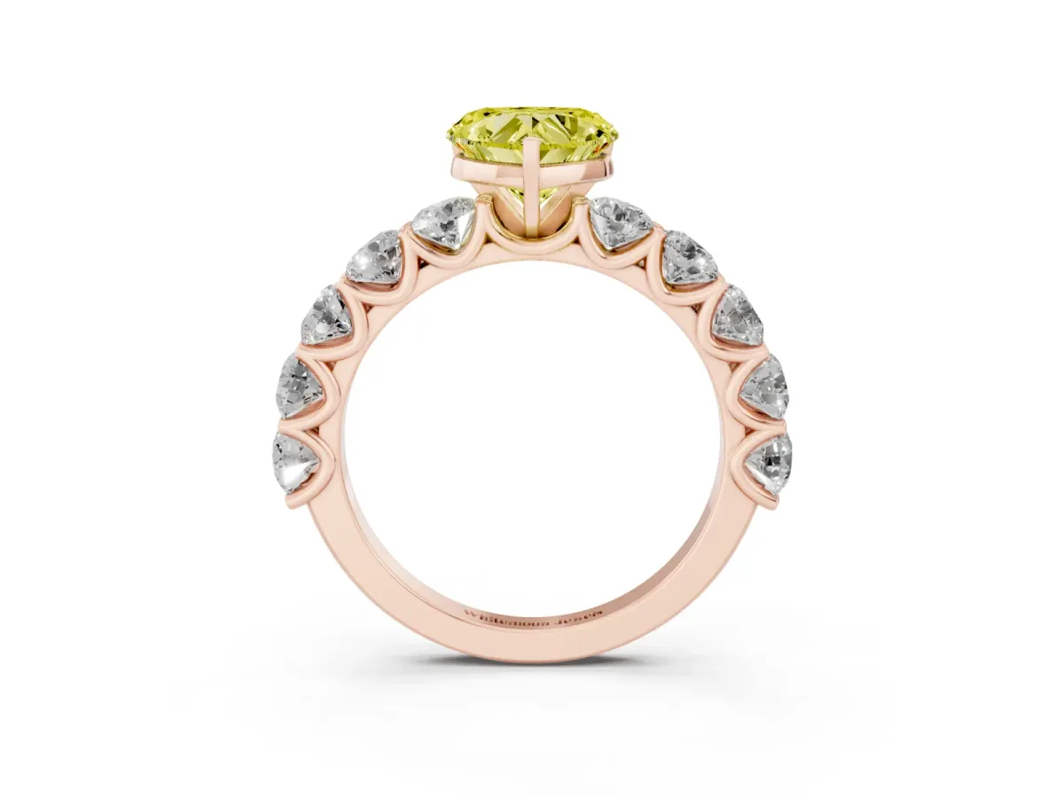 Fancy Yellow Heart Cut Diamond Prong Setting with Side Stones on a Pave Band Rose gold