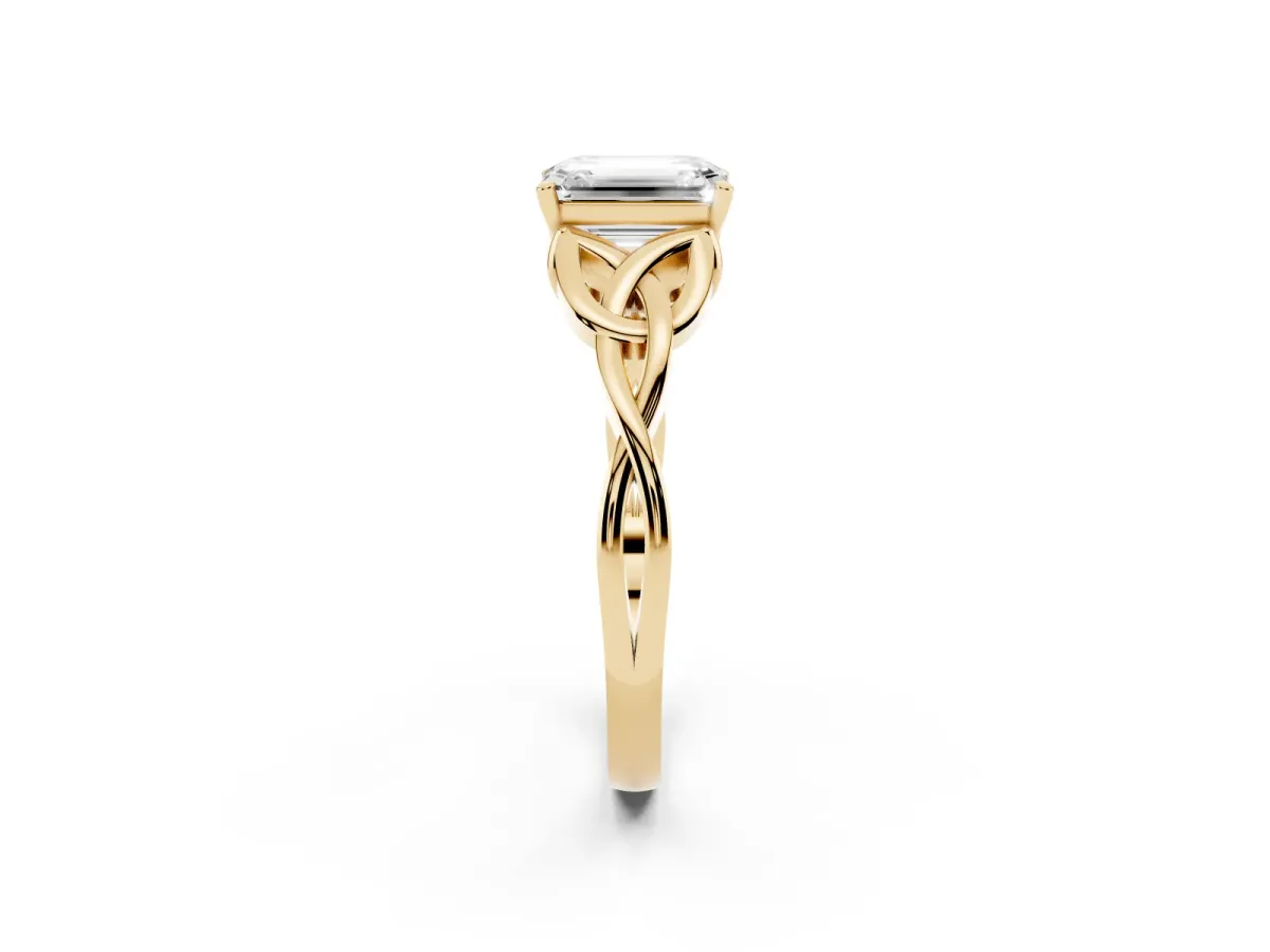 Emerald Cut Diamond Solitaire Engagement Ring with Celtic Knot Band and Four-Prong Setting Yellow gold
