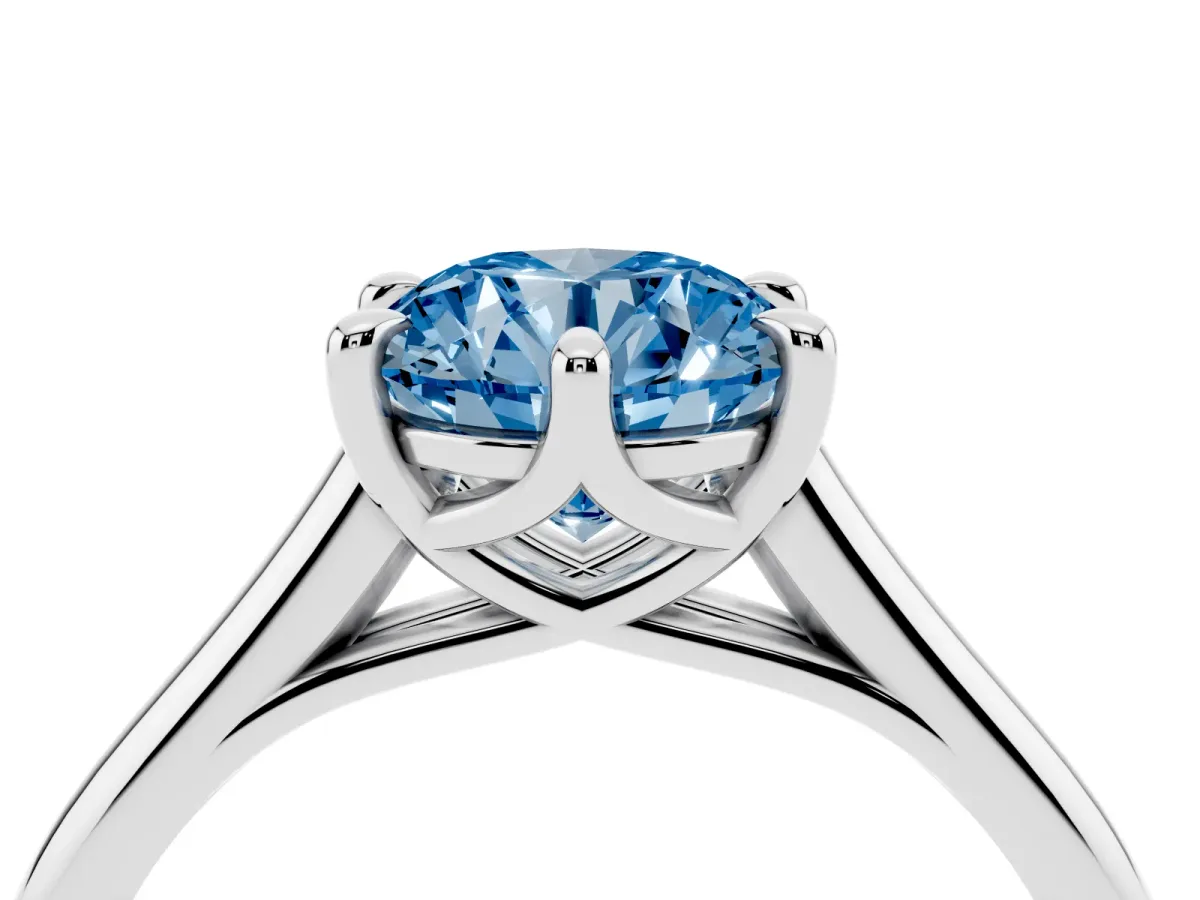 Fancy Blue Round Cut Solitaire Engagement Ring with Six-Prong Setting and Classic Band Silver