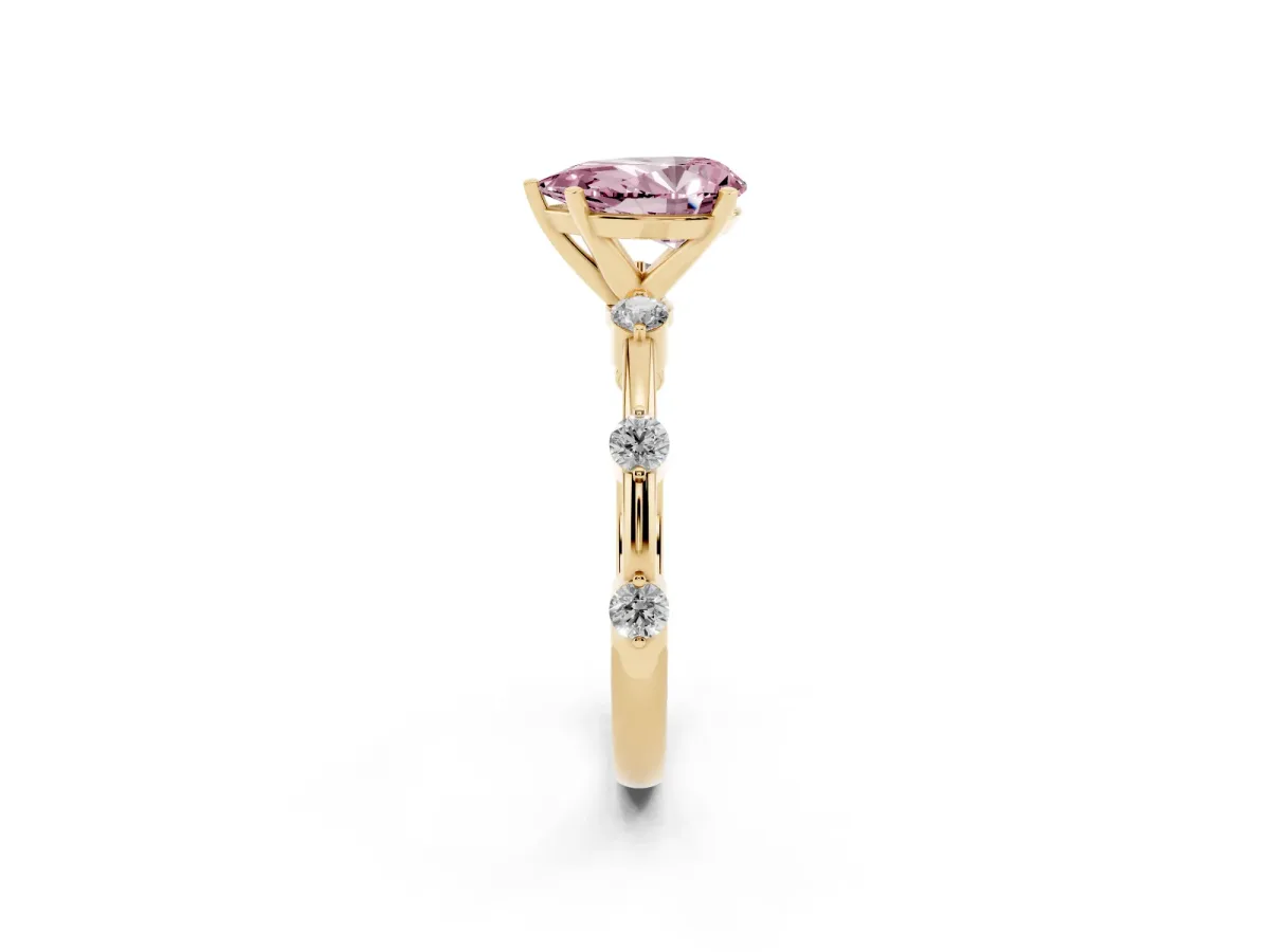 Fancy Pink Pear Cut Solitaire Diamond Ring with Bezel Set Side Stones and Prong Setting Yellow gold