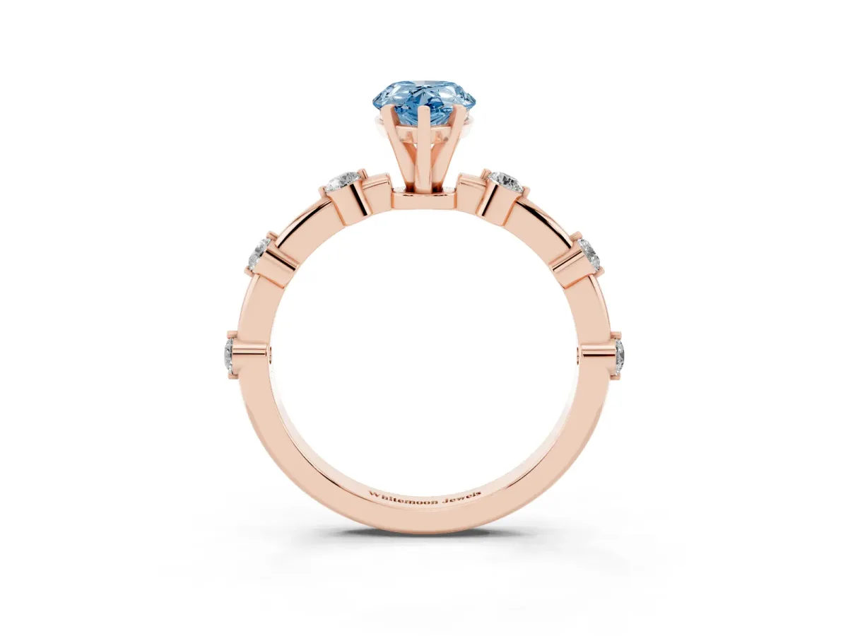 Fancy Blue Pear Cut Solitaire Diamond Ring with Bezel Set Side Stones and Prong Setting Rose gold