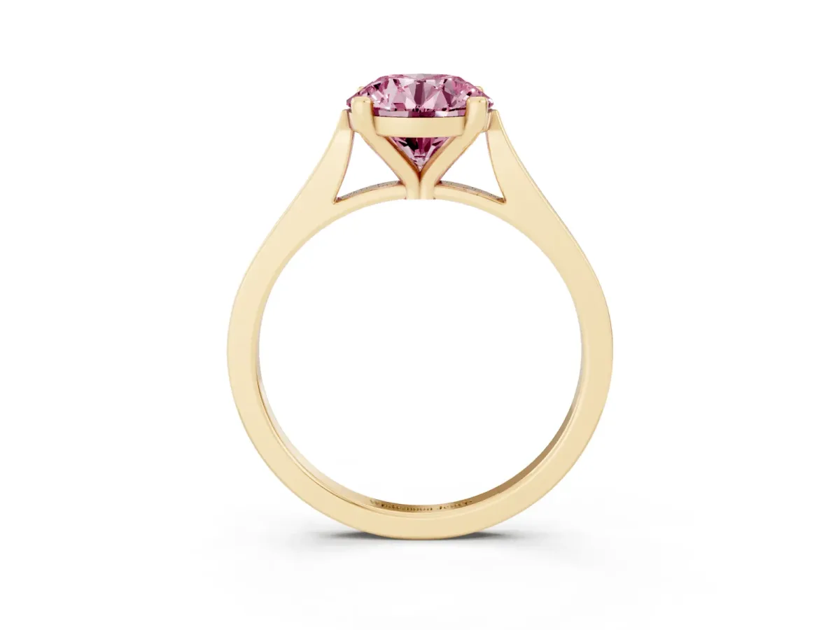 Fancy Pink Round Cut Solitaire Diamond Ring with Four-Prong Setting and Tapered Band Yellow gold